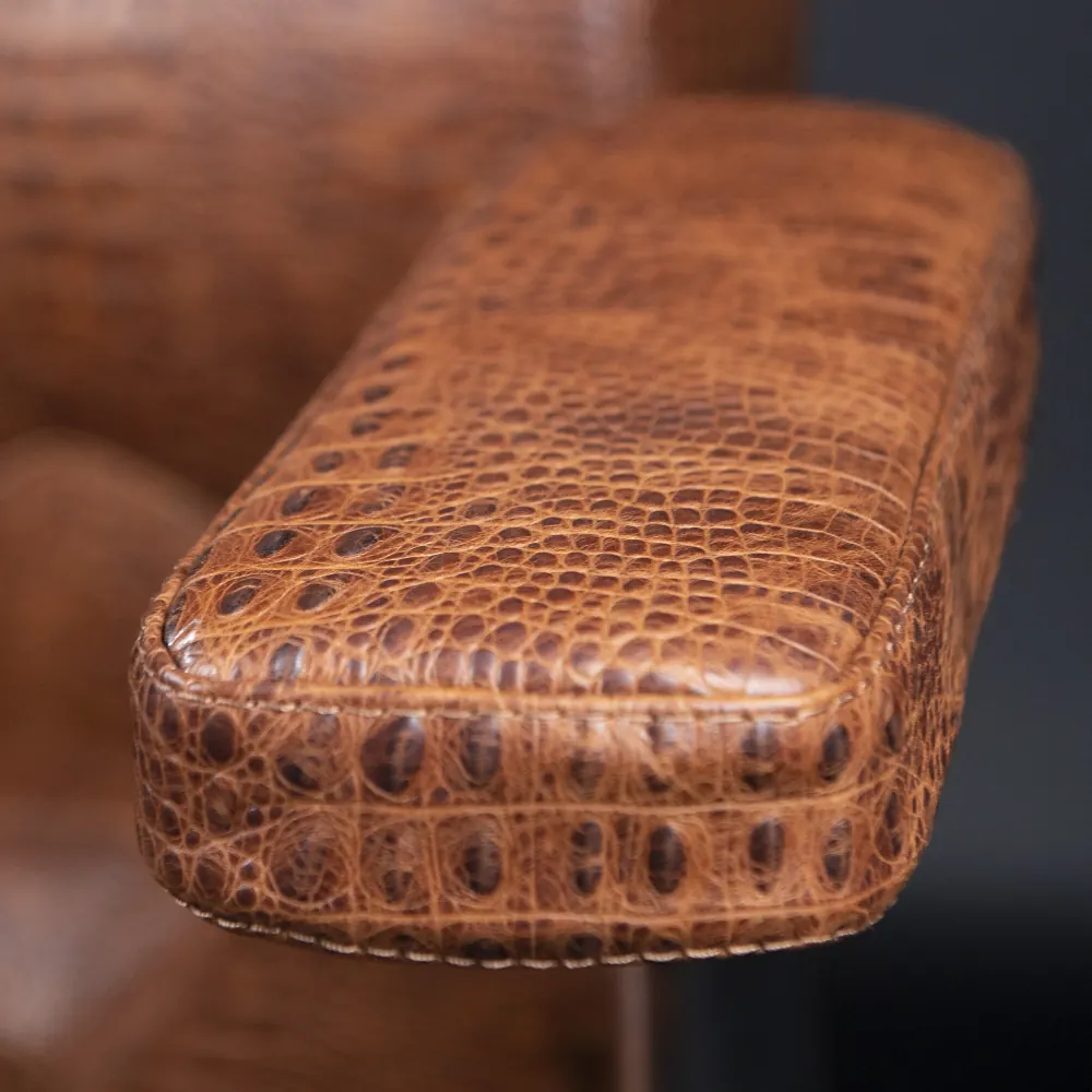Brown crocodile-leather armrest stitching